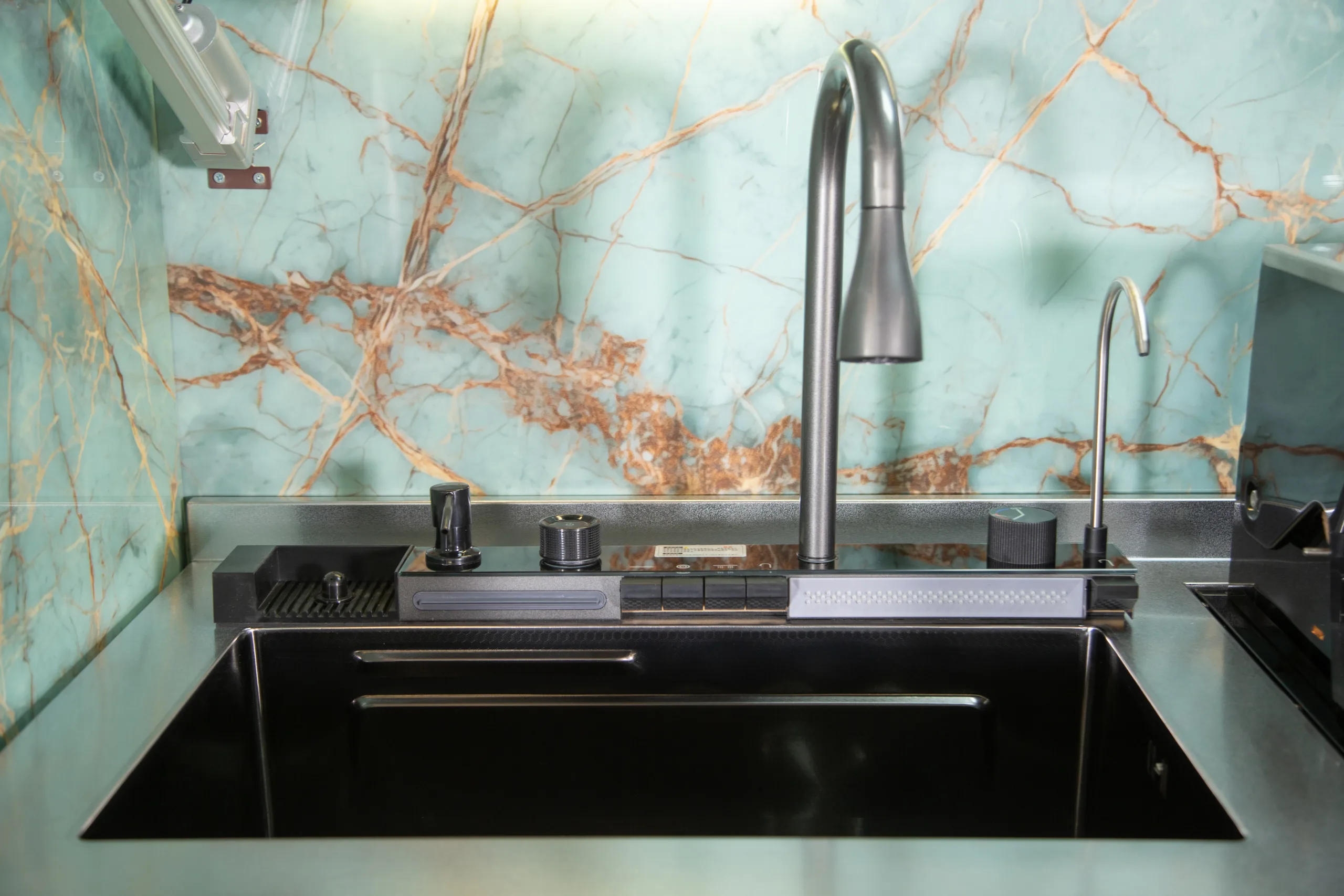 Integrated multi-function sink inside a Meta Lifestyle enclosed outdoor kitchen